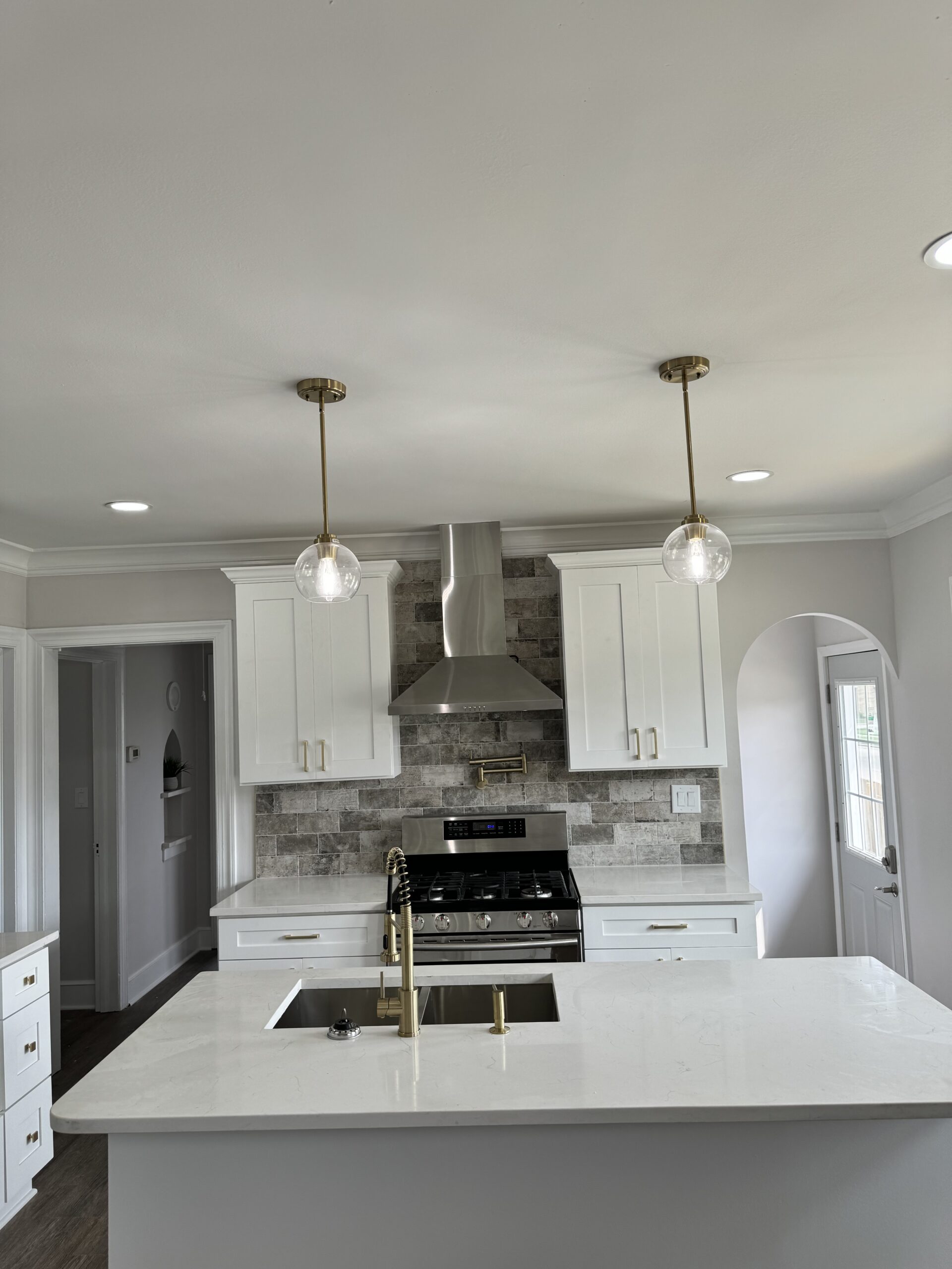 Finished interior renovation with fresh flooring and bright walls